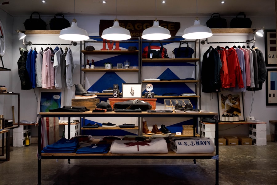 Person in a store holding an item and pausing thoughtfully before deciding to purchase — the mindful acquisition pause that prevents default buying and enforces the one-in one-out rule at source