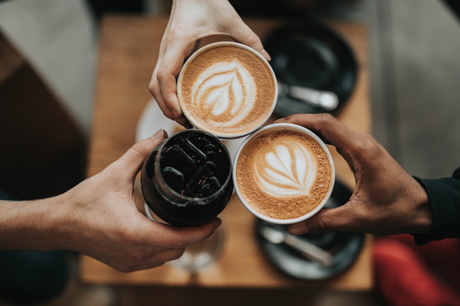 Person preparing morning coffee in a tidy kitchen — using the 4-minute coffee brewing window as an anchor habit to start the morning reset routine automatically