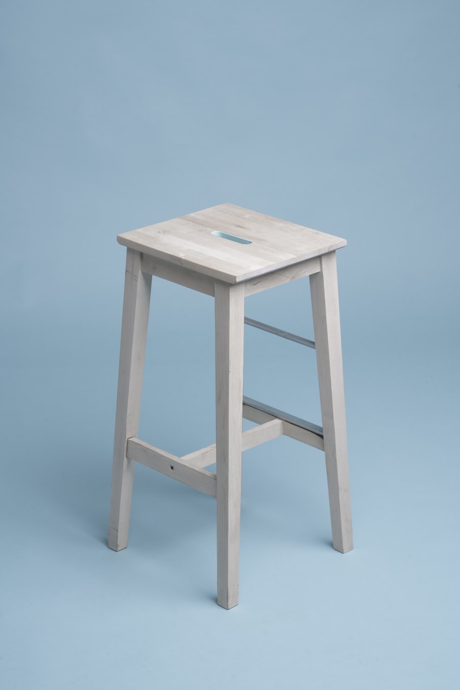 All kitchen tools laid out on a table in categories — cutlery, cooking utensils, baking tools, gadgets — the starting point for a use-frequency inventory before building a drawer system