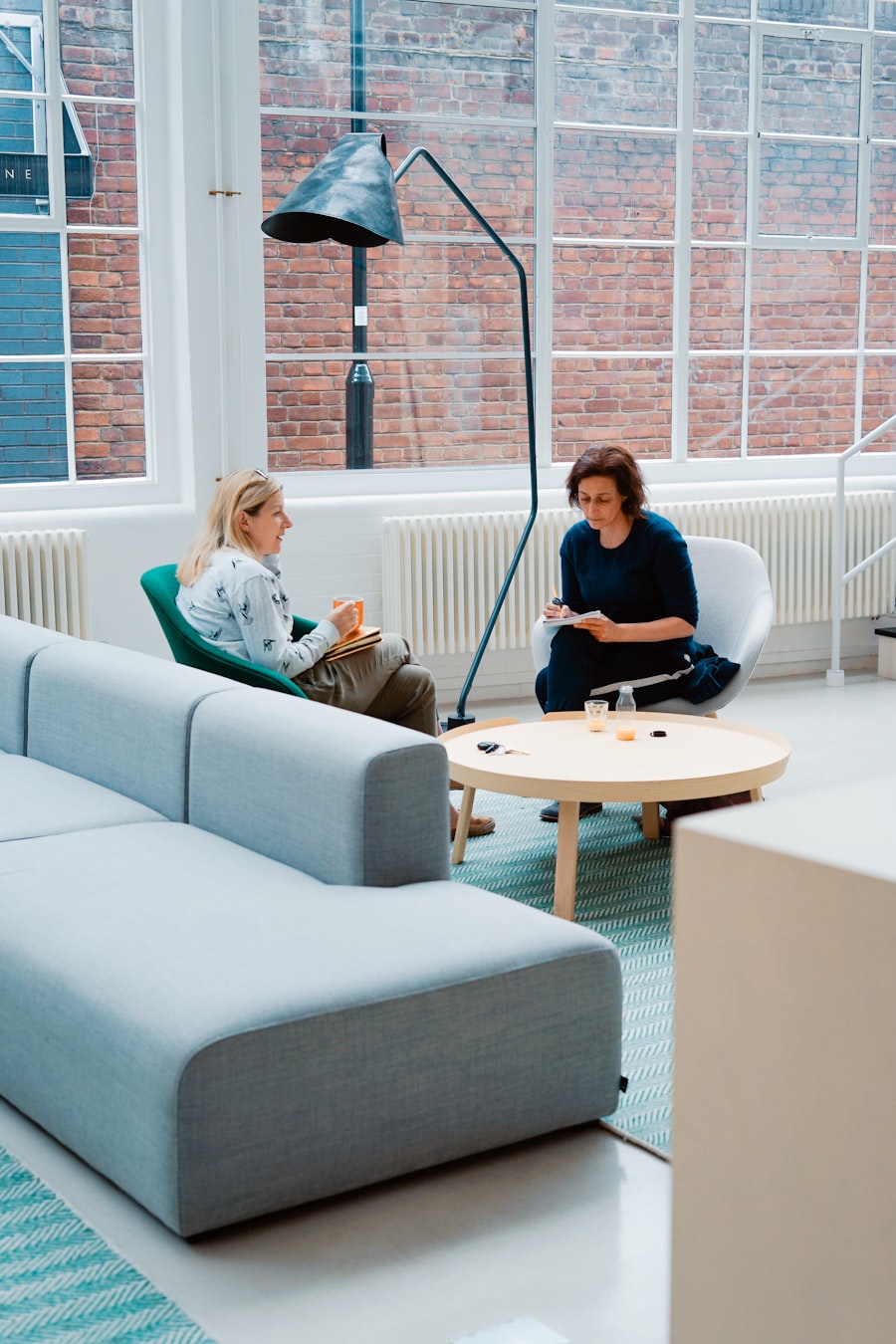 Small apartment living room with a storage ottoman serving as coffee table, extra seating and internal storage simultaneously — the three-function piece that defines high-ratio multifunctional furniture