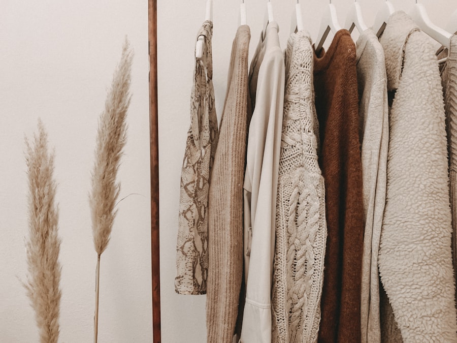 Wardrobe interior reconfigured with double hanging rail for short garments, shelf inserts, door-mounted accessory organizers and clear shoe boxes on the floor — maximized wardrobe capacity without changing external footprint