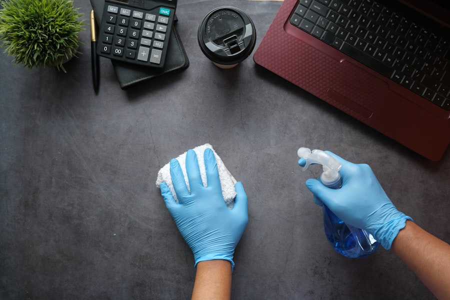 Color-coded microfiber cloth sets in red, blue, yellow and green stored in separate labeled hooks — the color-coding system that prevents cross-contamination between kitchen, bathroom and glass cleaning